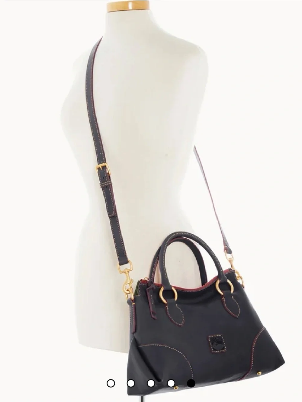Dooney and Bourke Florentine Satchel 30 in the color Navy. EUC comes w/bag charm